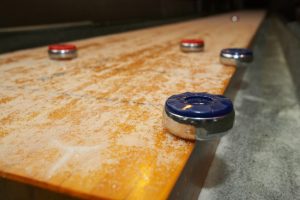 Why Shuffleboard Tables Will Make a Great Addition to Your Game Room